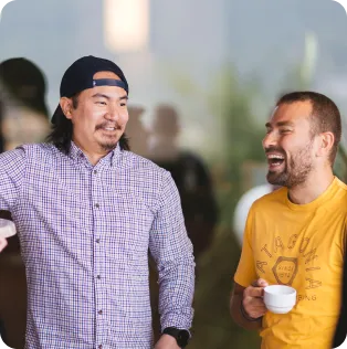 two Beefree employees laughing